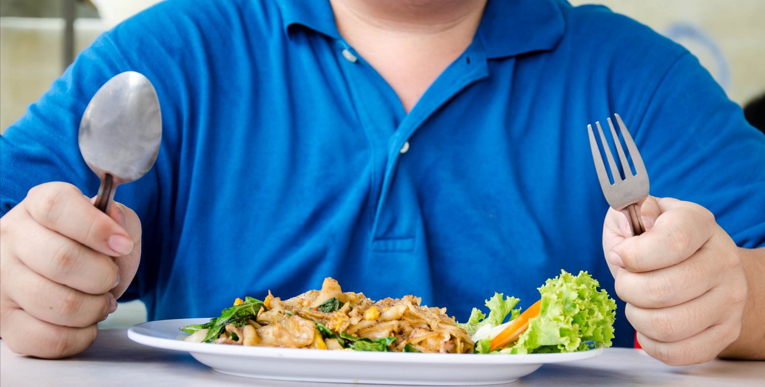 A hungry man with a healthy plate