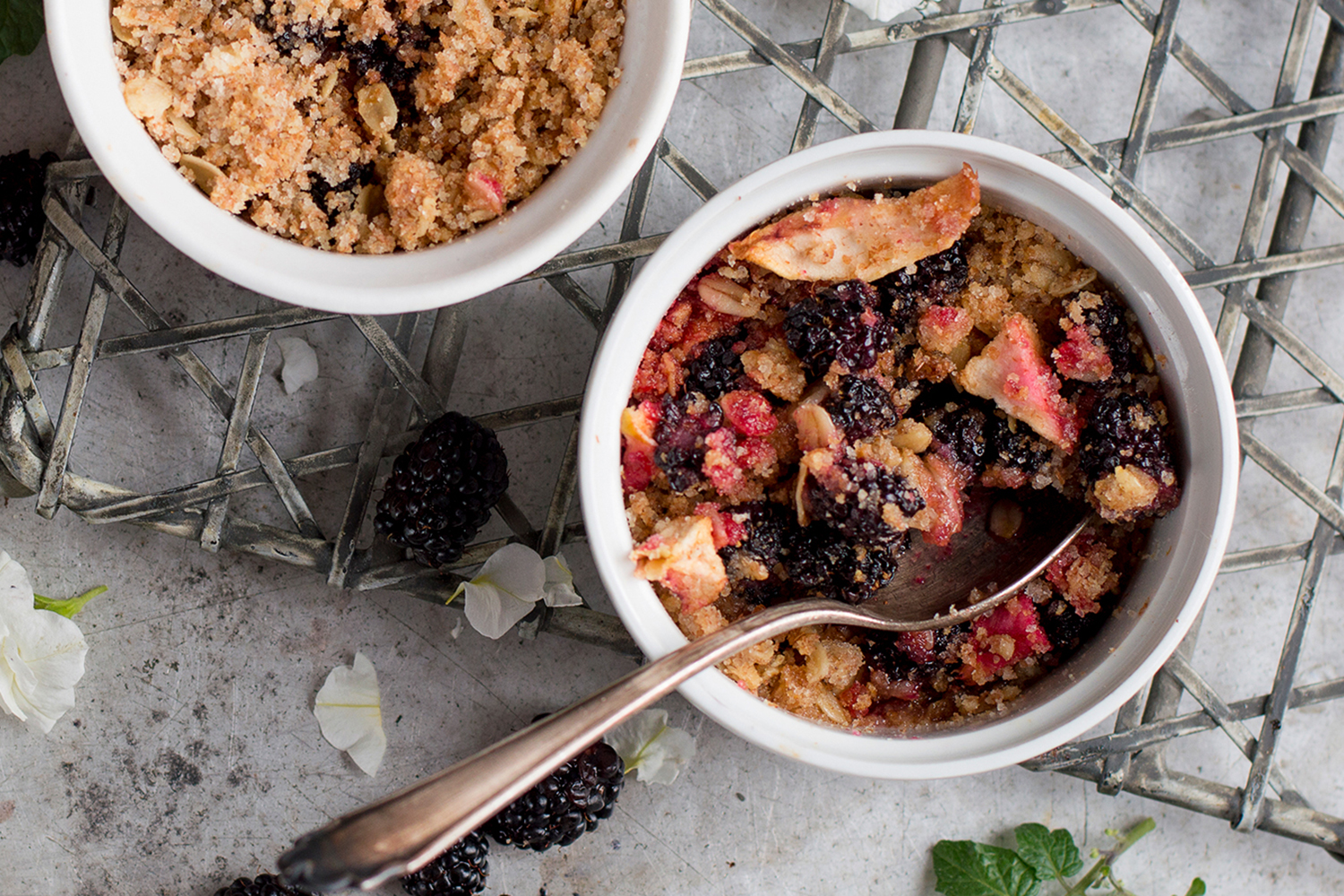 a freshly baked bowl of berry and oat crumble