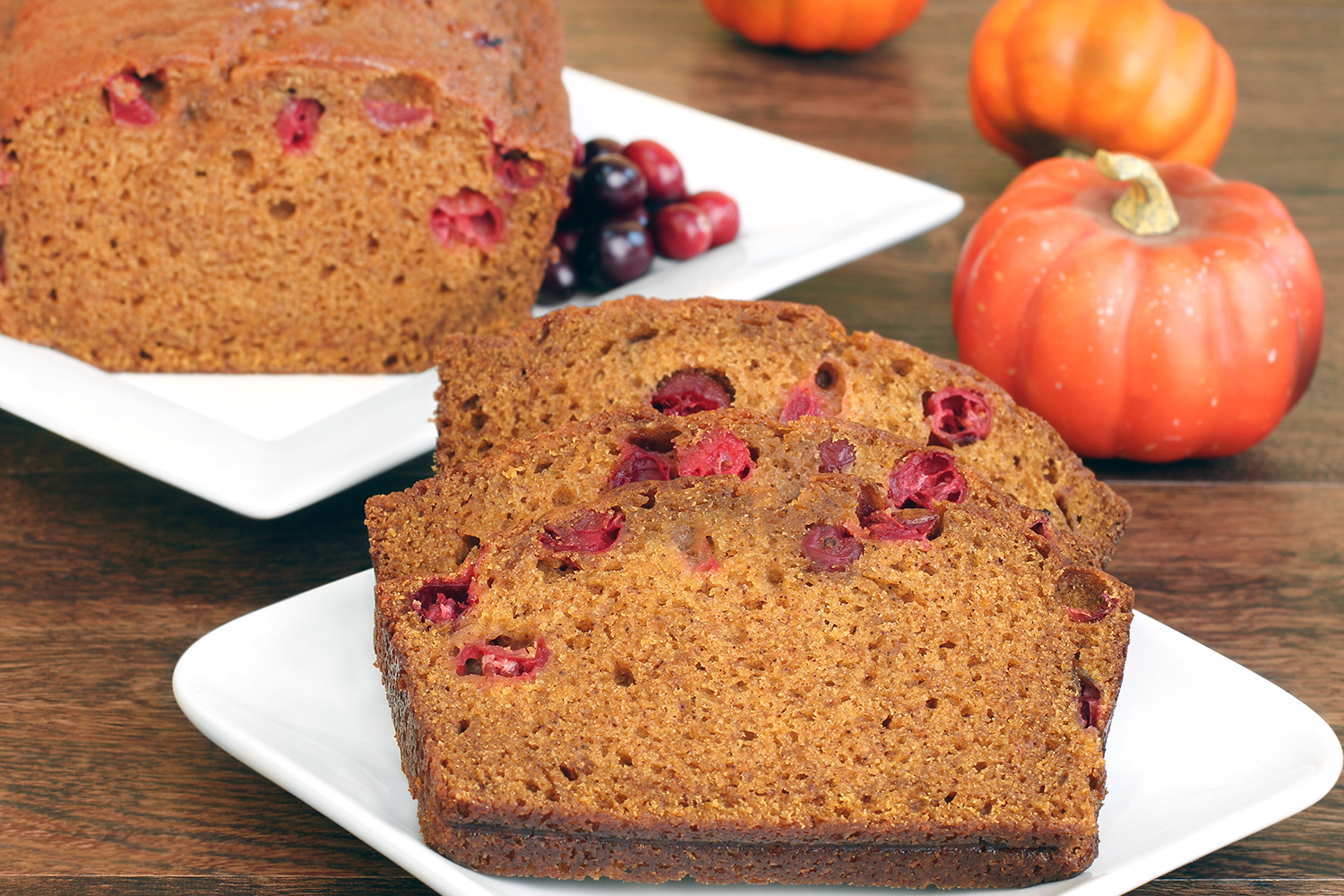 a slice of pumpkin bread with cranberries