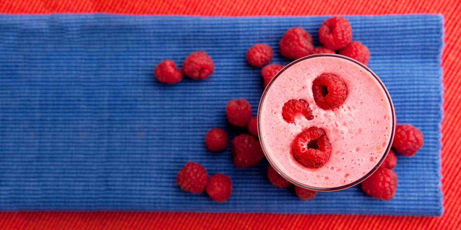 Fresh rasberries and fruit smoothie