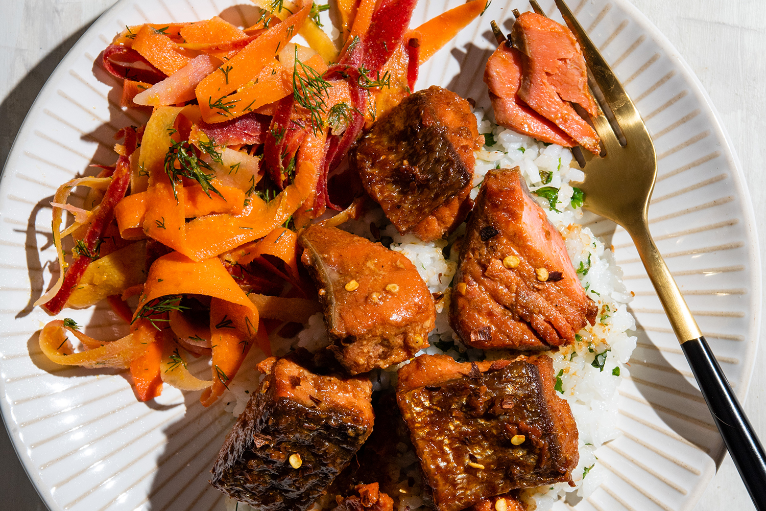 chunks of glazed and baked salmon