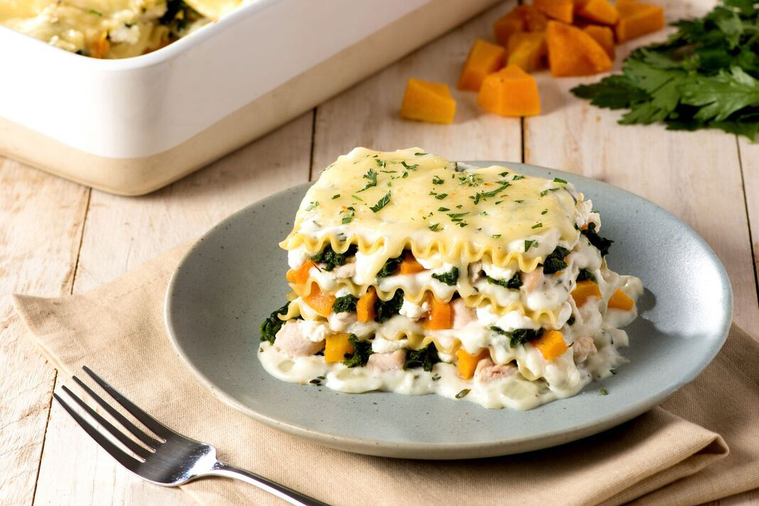 A slice of lasagna made with thanksgiving leftovers