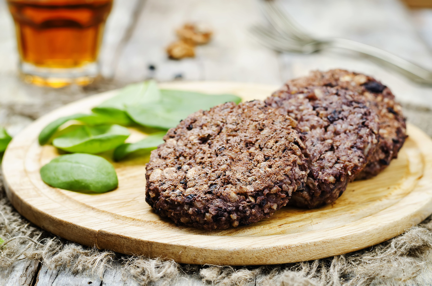 Prepared Chipotle Black Bean and Rice Burgers on a cutting board.