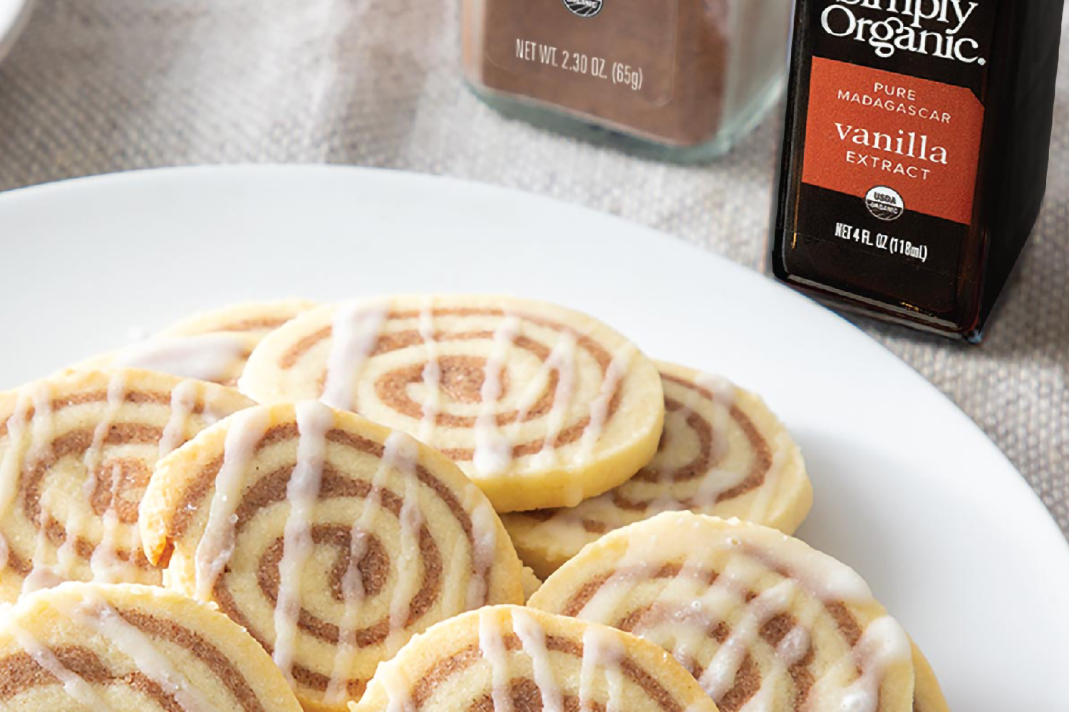 a plate of cookies that look like cinnamon rolls