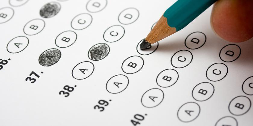 someone taking a multiple-choice quiz