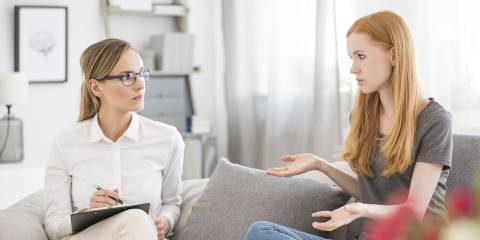 a young woman talking to her therapist