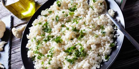a bowl of grated cauliflower couscous