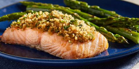 A plate of salmon crusted with quinoa