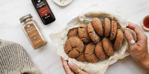 a plate of freshly-baked ginger snap cookies