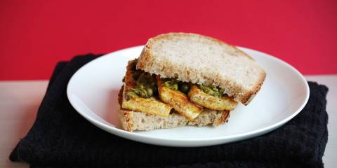 a tofu sandwich on a plate